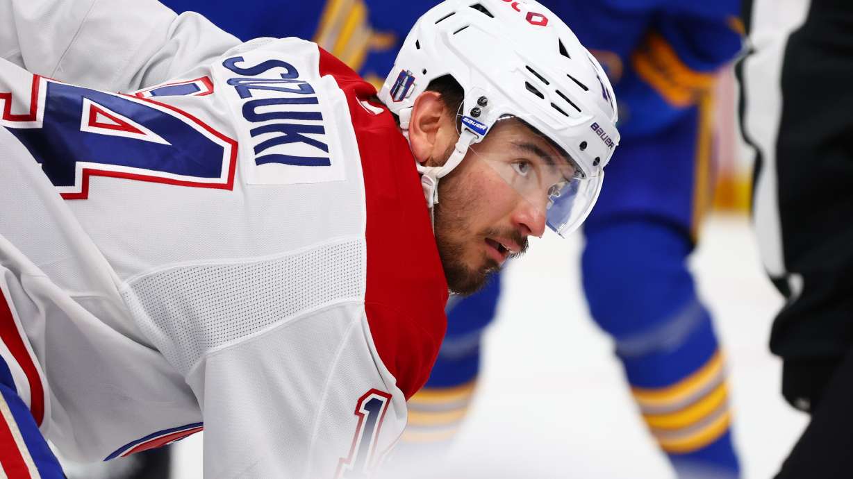 Montreal Canadiens center Nick Suzuki lines up for a face-off during the second period in Game 5 of a second-round NHL hockey Stanley Cup playoff series against the Buffalo Sabres, Thursday, May 14, 2026, in Buffalo, N.Y.