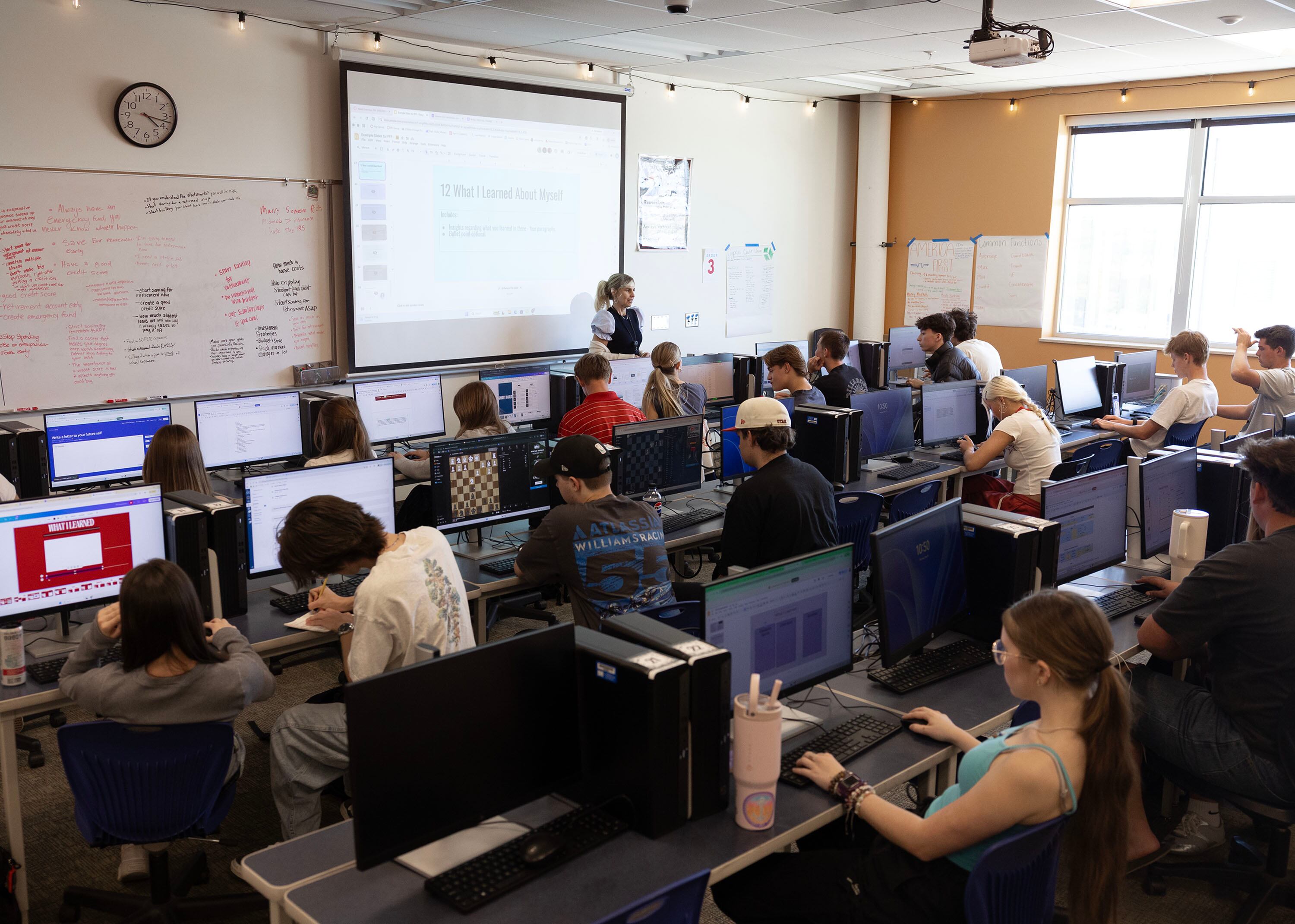 Michelle Butler speaks to her financial literacy class at Brighton High School in Cottonwood Heights on Thursday.