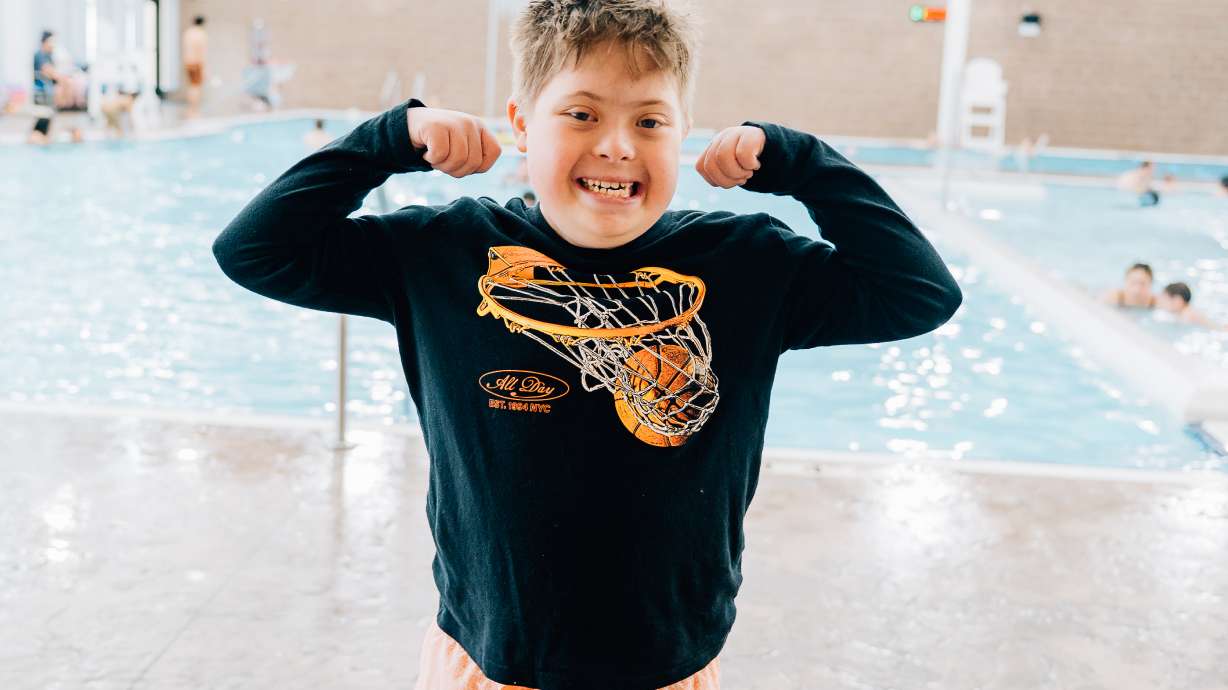 Ten-year-old Jude Garrett, of North Ogden, goes swimming with friends to celebrate World Down Syndrome Day.