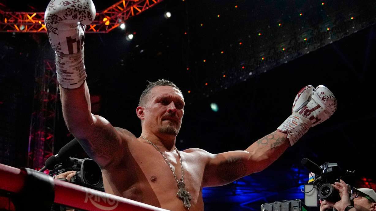 FILE - Ukraine's Oleksandr Usyk celebrates winning the undisputed world heavyweight boxing title fight against Britain's Daniel Dubois in London, July 19, 2025.
