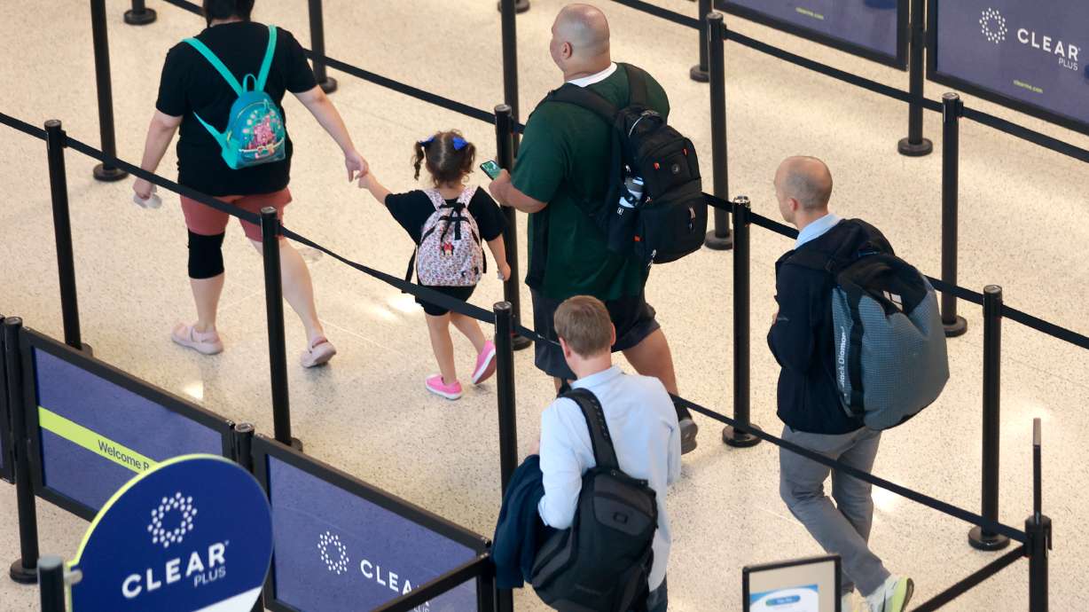 People walk through security at the Salt Lake City International Airport in Salt Lake City on Sept. 10, 2025. The airport received a $6.6 million federal grant on Saturday to expand security screening checkpoints, including dedicated family security lanes.