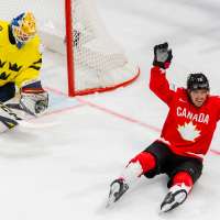 Switzerland beats defending champion the US in ice hockey worlds opener