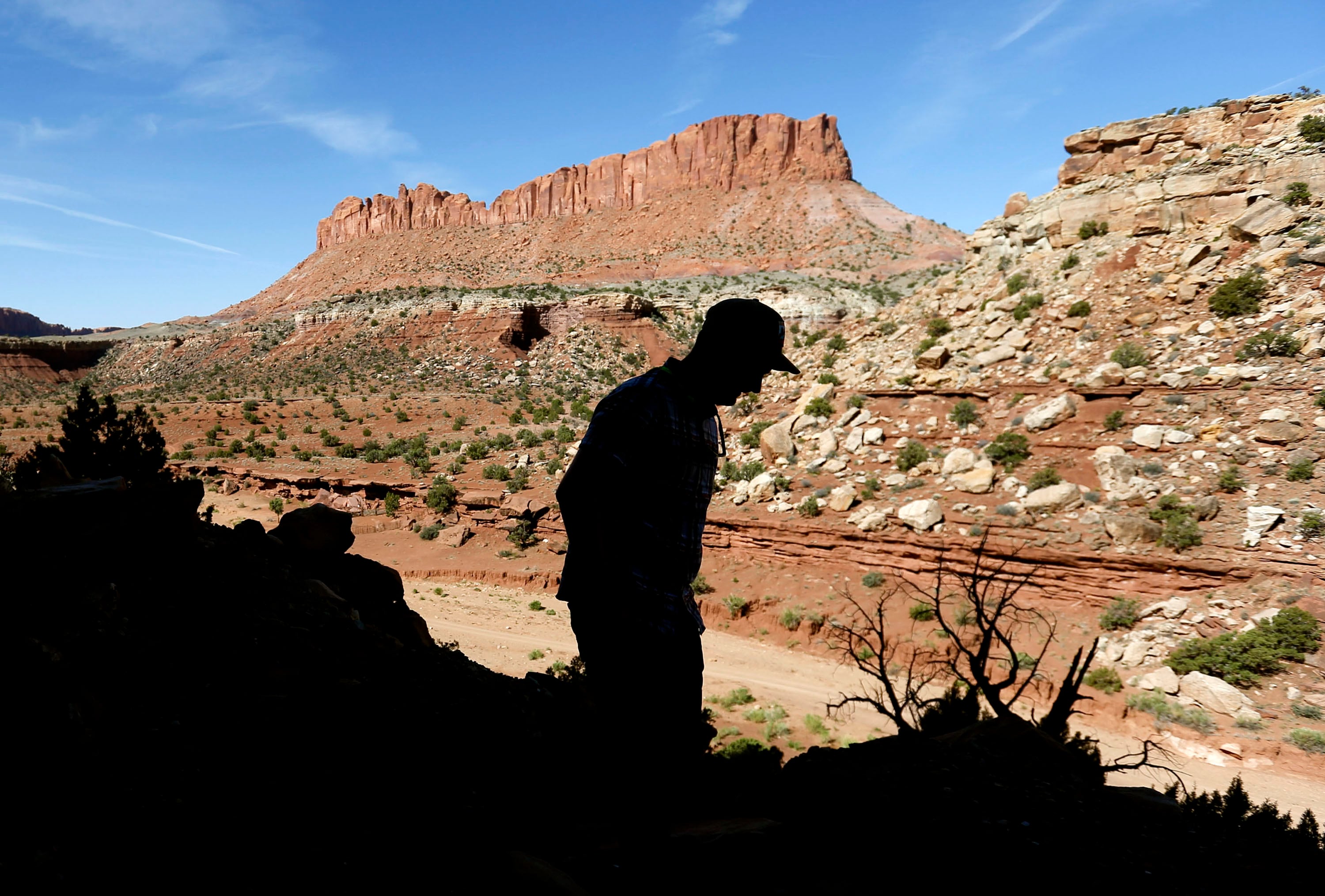 Nick Proctor walks in the Colt Mesa area of the former Grand Staircase-Escalante National Monument on May 14, 2021. More than 150 scientists sent letter on Thursday to federal officials defending protections for the monument.