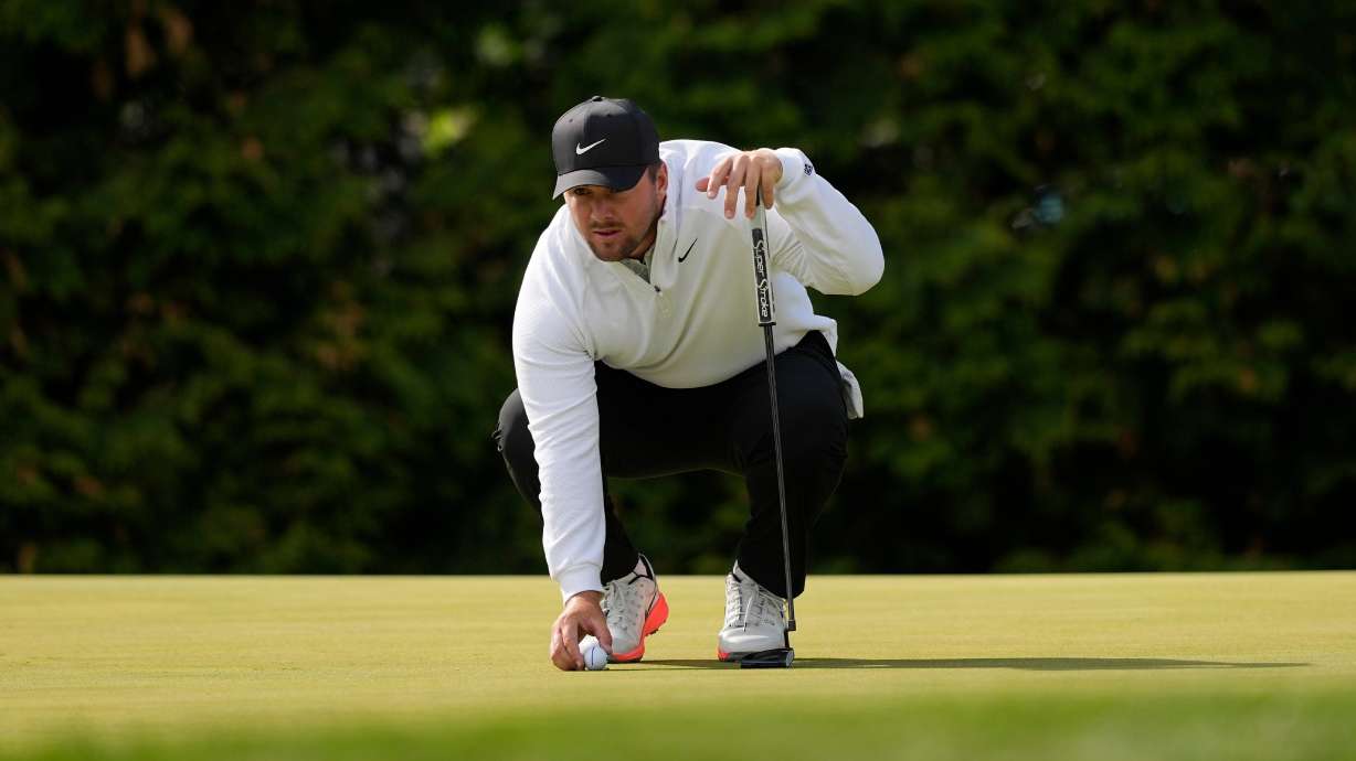 Chris Gotterup lines up his ball on the 12th green during the second round of the PGA Championship golf tournament at Aronimink Golf Club, Friday, May 15, 2026, in Newtown Square, PA.