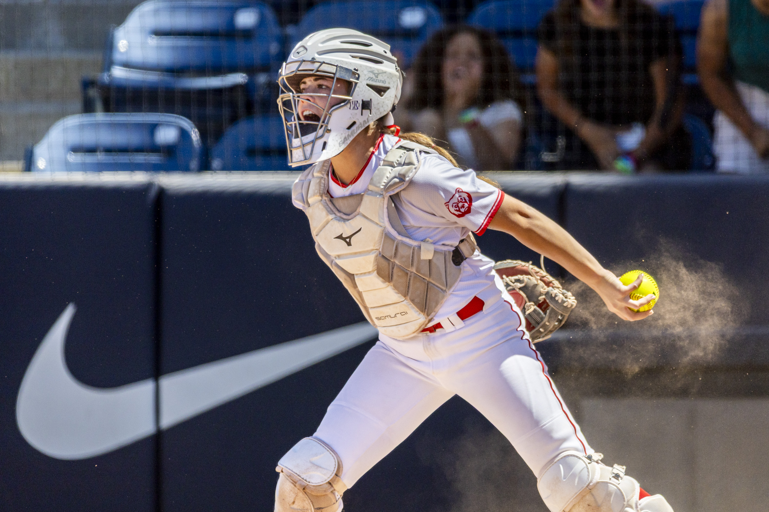 Bear River catcher Paycie Richards (8) celebrates after making a catch for an out against Desert Hills during the first game of the 4A softball championship, held at Gail Miller Field in Provo on Friday, May 15, 2026.