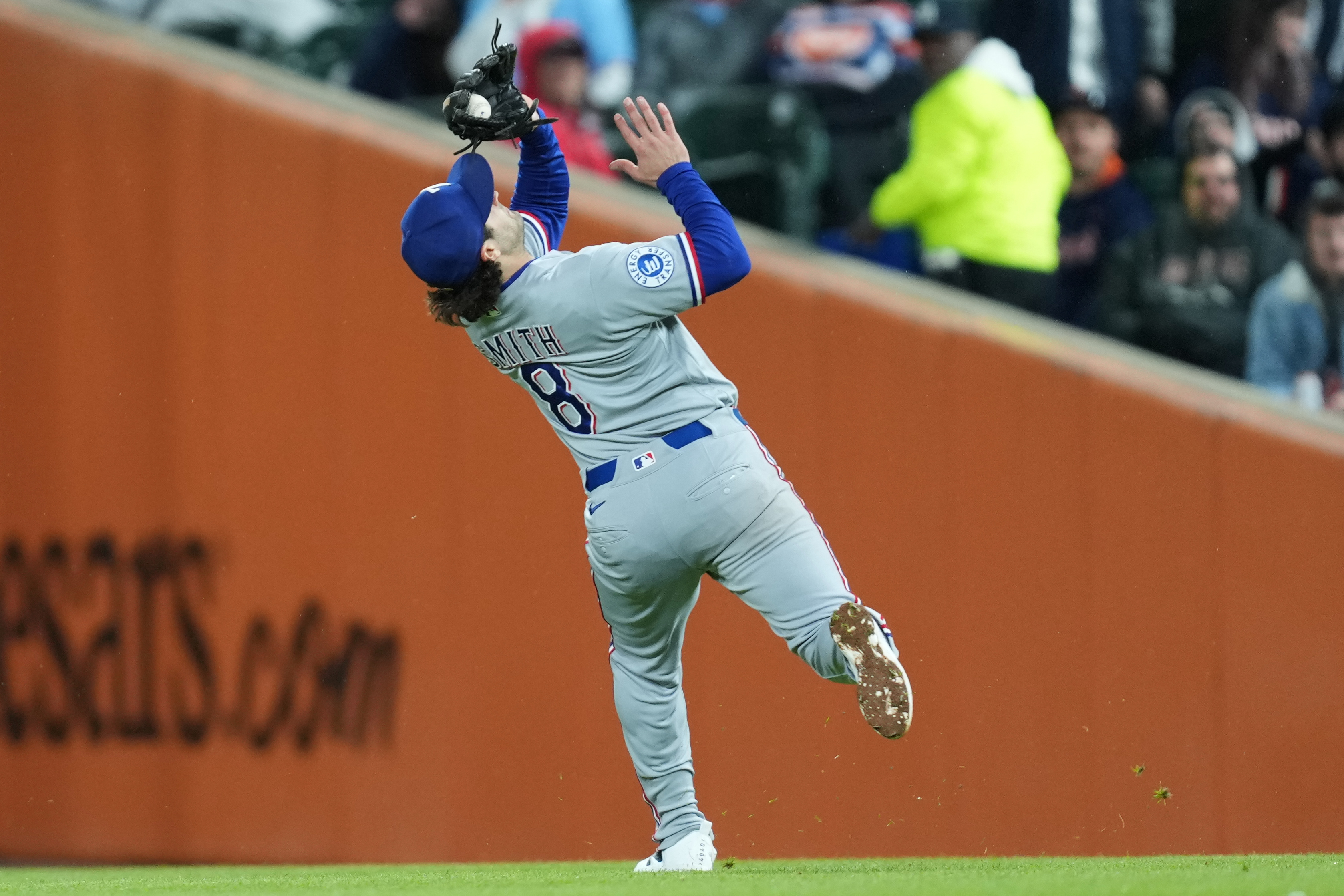 Texas Rangers second baseman Josh Smith (8) catches a Detroit Tigers' Matt Vierling fly ball during the fifth inning of a baseball game Friday, May 1, 2026, in Detroit. 