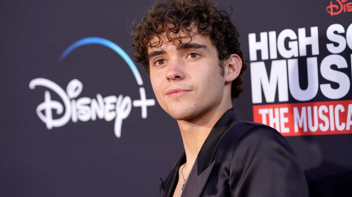Joshua Bassett, a cast member in "High School Musical: The Musical: The Series," at the Season 3 premiere, July 27, 2022, at Walt Disney Studios in Burbank, Calif. Bassett returned to share a message of hope and faith at East High School on Friday.