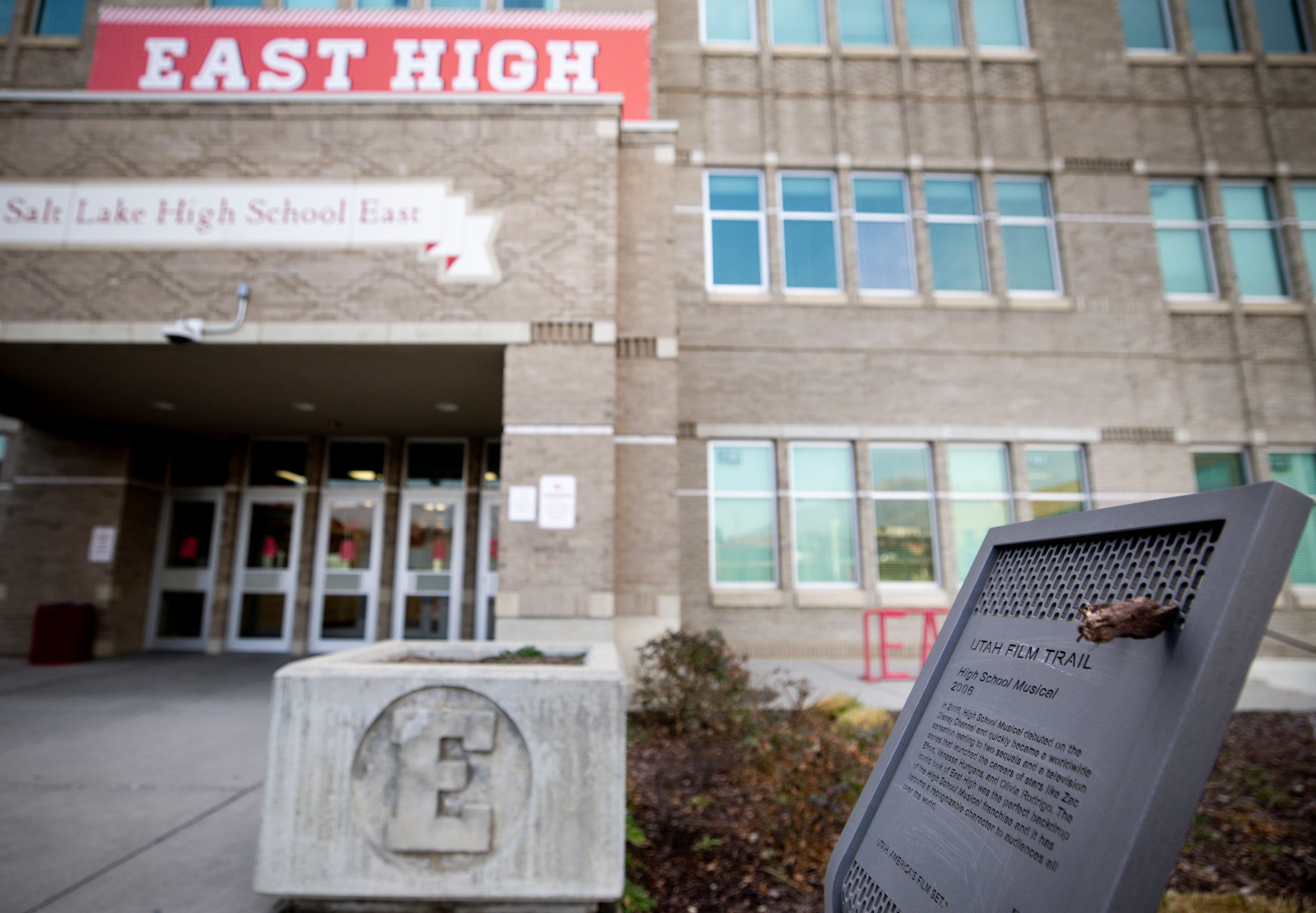 A plaque for the Utah Film Trail sits outside of East High School in Salt Lake City on Jan. 12. Actor Joshua Bassett made a stop at the school as part of his book tour on Friday.