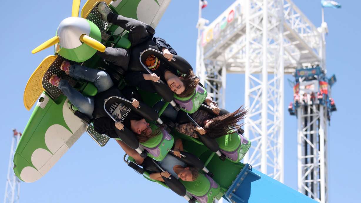 People ride Air Race during Utah State University Physics Day at Lagoon Amusement Park in Farmington on Friday. Thousands of teens from Utah, Idaho, Wyoming and Nevada participated in the STEM learning event.