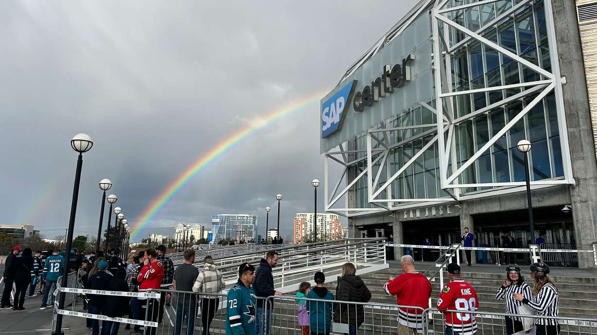 FILE - A rainbow is shown as fans line up outside SAP Center at San Jose before an NHL hockey game between the Chicago Blackhawks and the San Jose Sharks in San Jose, Calif., March 23, 2024.