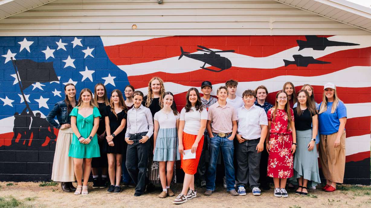 South Sevier Middle School students in front of a mural they painted during an unveiling ceremony on Friday at Lion's Park in Monroe to commemorate the country's 250th anniversary.