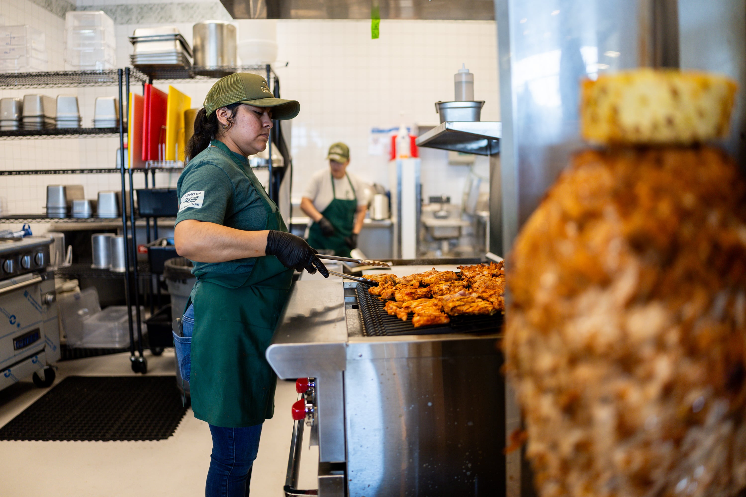 Alma Hernandez prepares al pastor tacos at Taco Culture  in American Fork  on May 8.