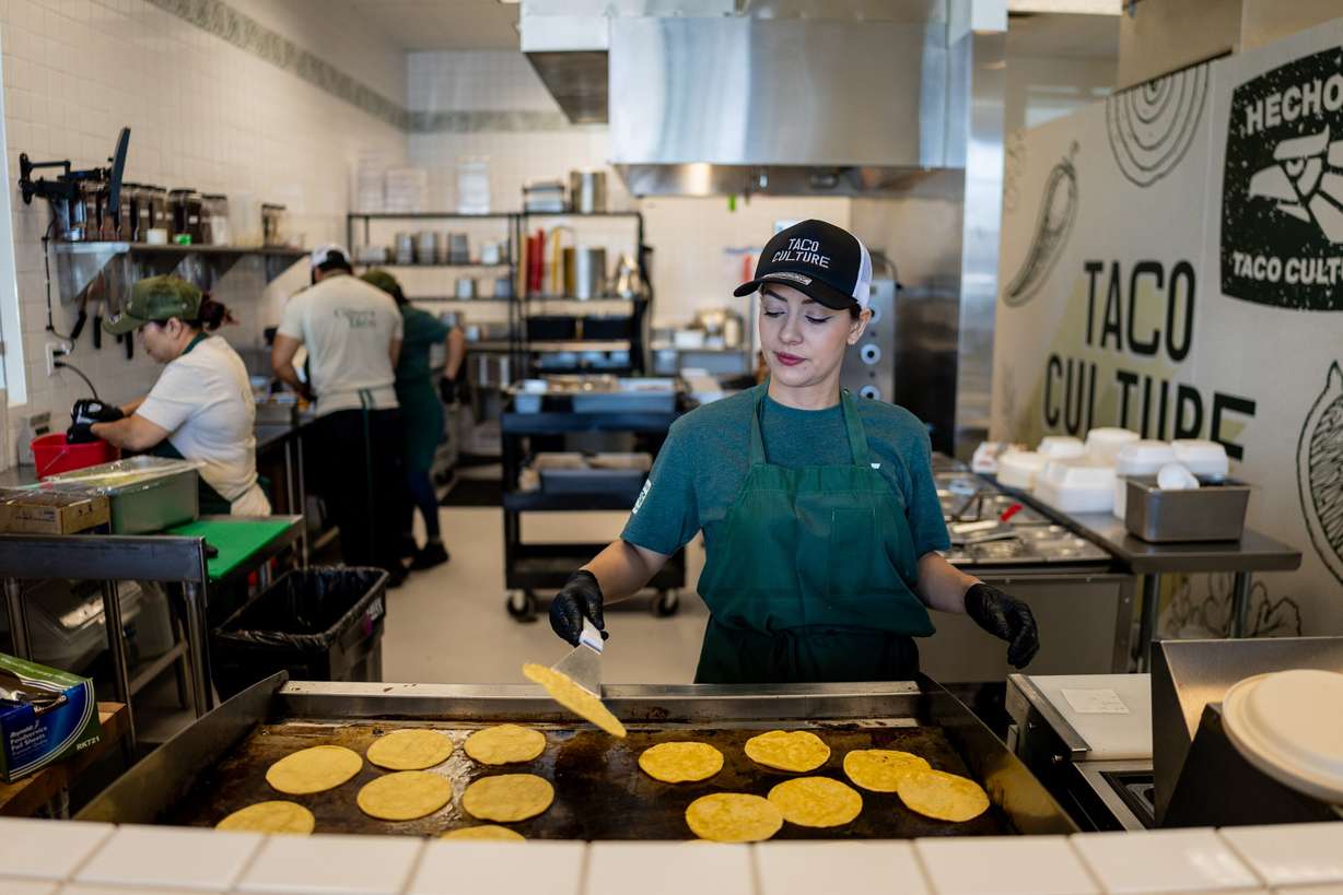 Maria Jimenez prepares tacos at Taco Culture in American Fork on May 8.