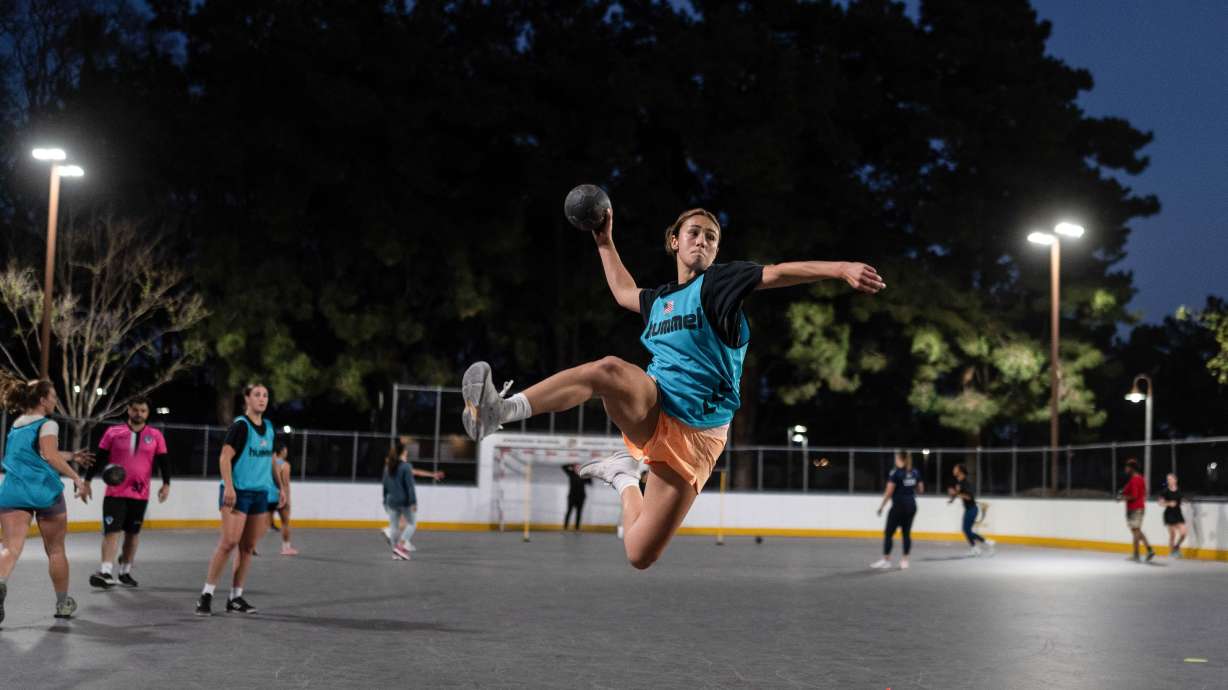 Devyn Holbrook takes a jump shot during a handball training session in Tustin, Calif., Wednesday, March 25, 2026.