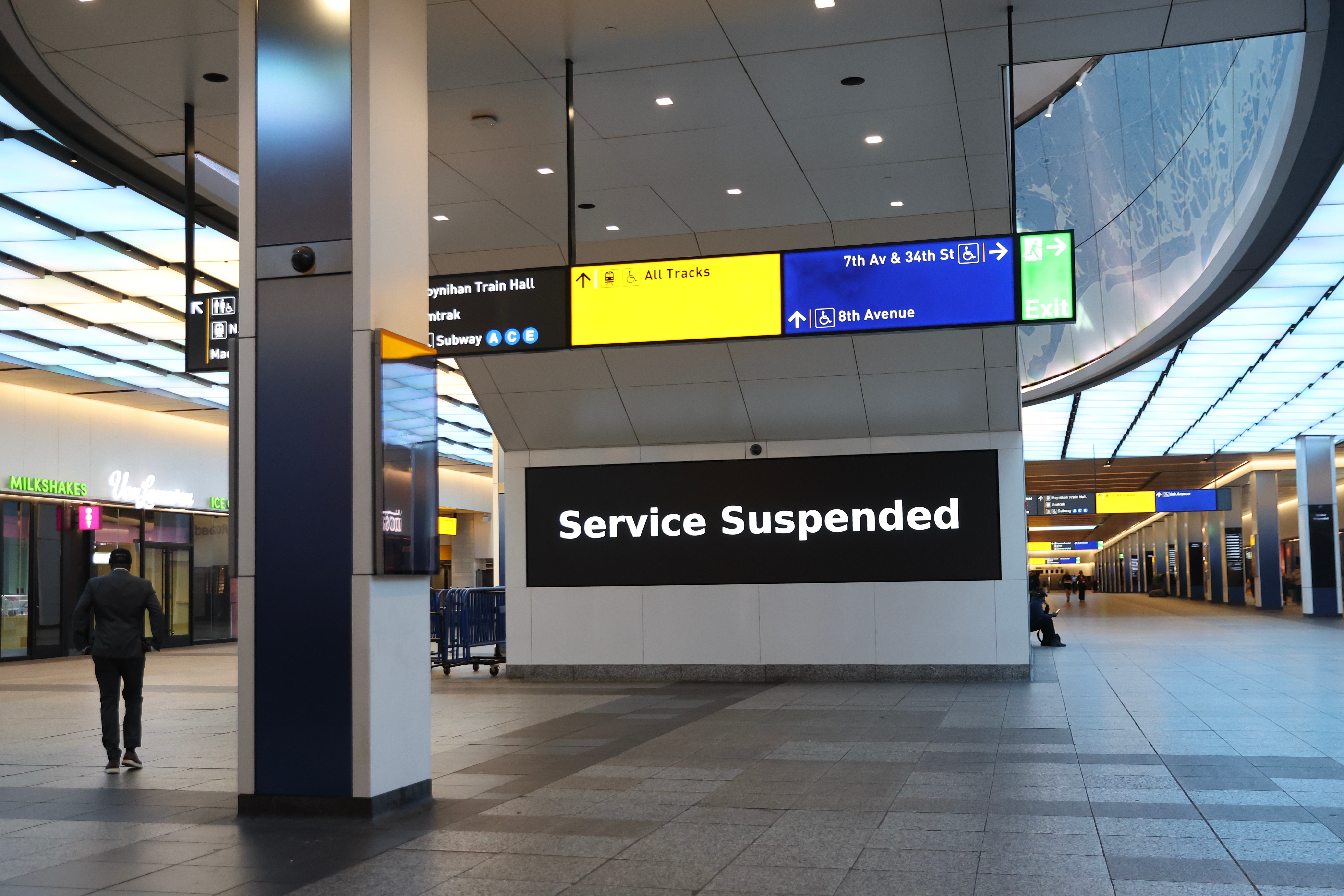 Service suspended signs are posted inside Penn Station on the first day of a Long Island Rail Road strike, Saturday, in New York. The walkout is the first for the railroad since 1994.