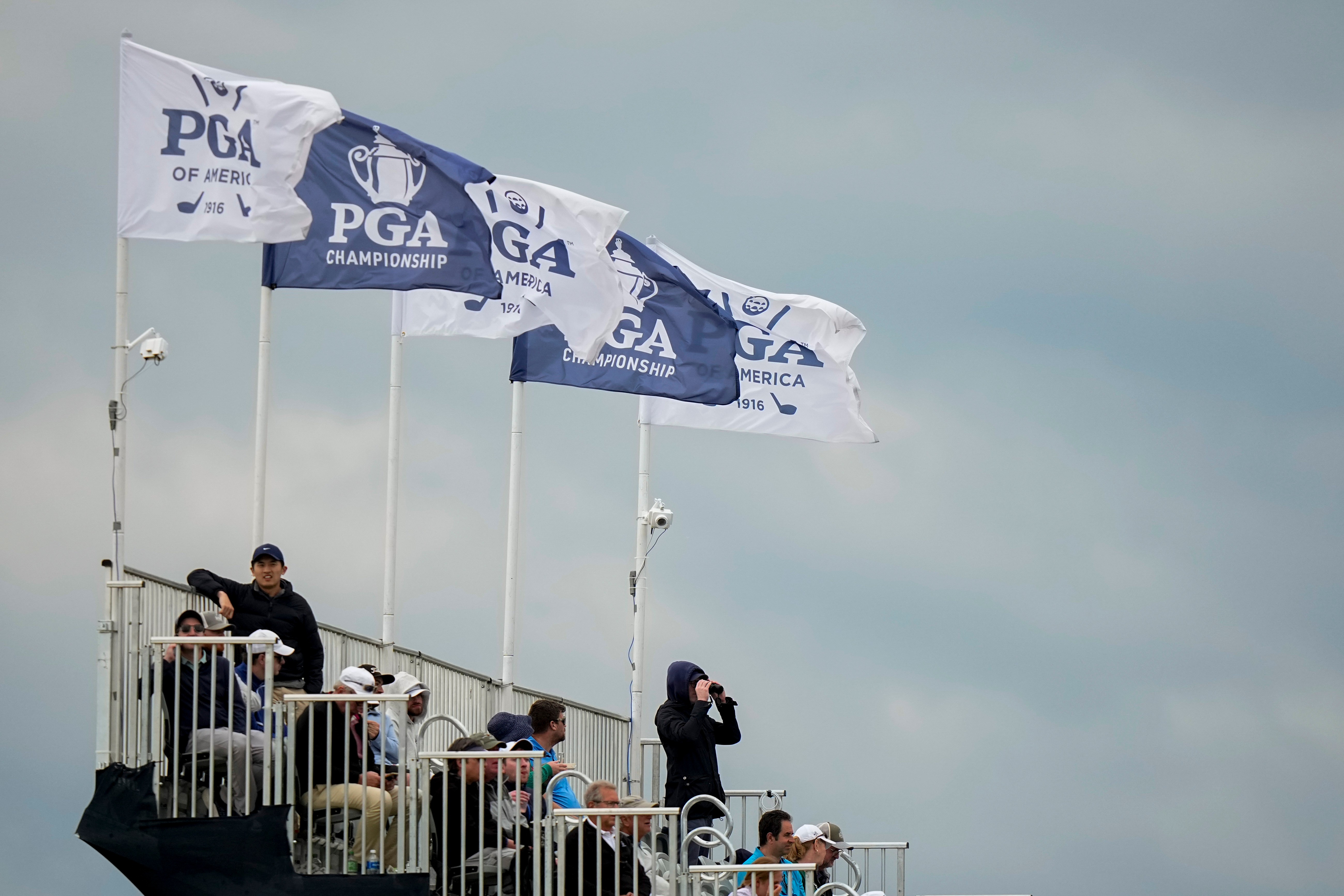 Fans watch on the seventh hole during the second round of the PGA Championship golf tournament at Aronimink Golf Club, Friday, May 15, 2026, in Newtown Square, PA. 