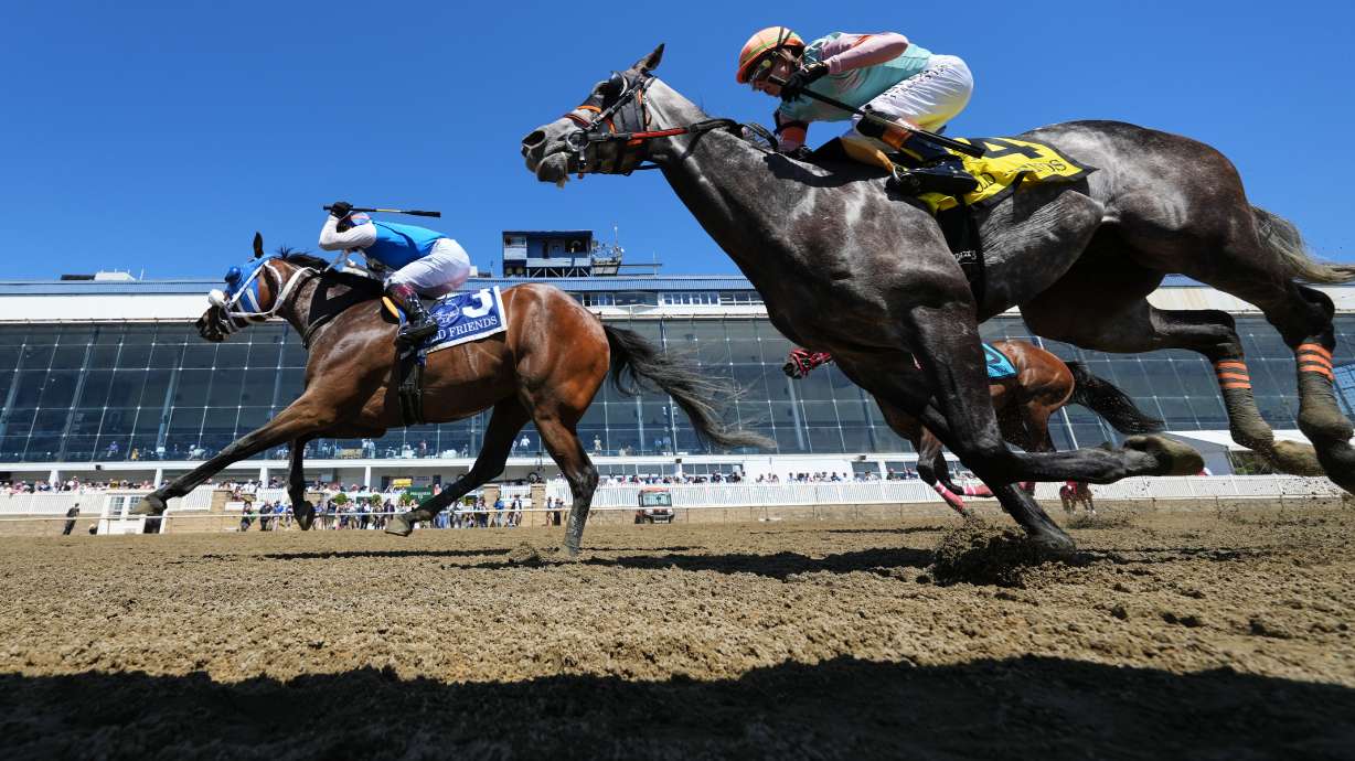 Jeiron Barbosa, left, atop Wickeddivine, edges out Irad Ortiz Jr., right, atop Freeze the Fire, to win an undercard race ahead of the 151st running of the Preakness Stakes horse race, Saturday, May 16, 2026, at Laurel Park in Laurel, Md.