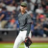 Weaver's fib: Tells injured Holmes he had name written in cap because `it just felt right to say'