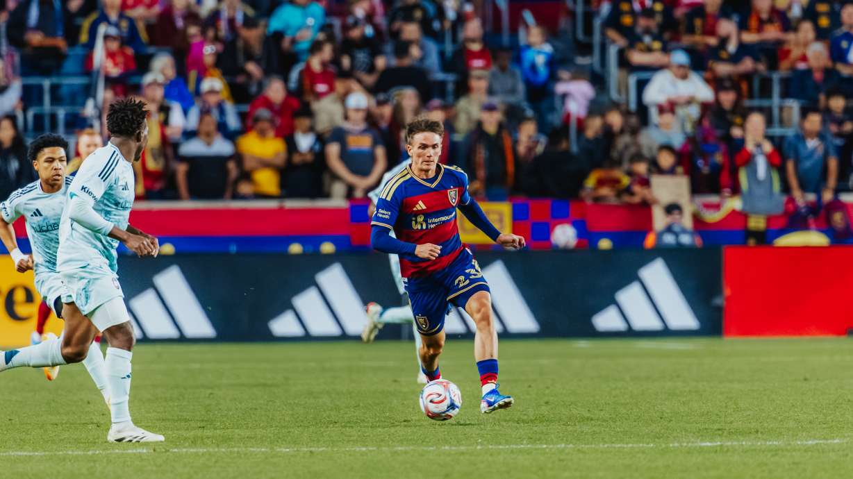 Real Salt Lake winger Zach Booth looks to pass during a 2-1 win over the Colorado Rapids in an MLS match, Saturday, May 16, 2026 in Sandy, Utah.