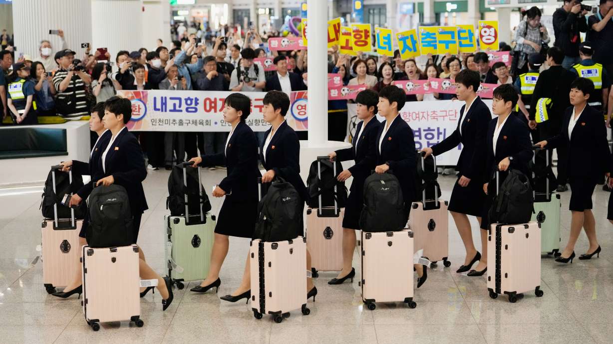 Members of North Korea's soccer club Naegohyang Women's FC team arrives at Incheon International Airpot in Incheon, South Korea, Sunday, May 17, 2026.