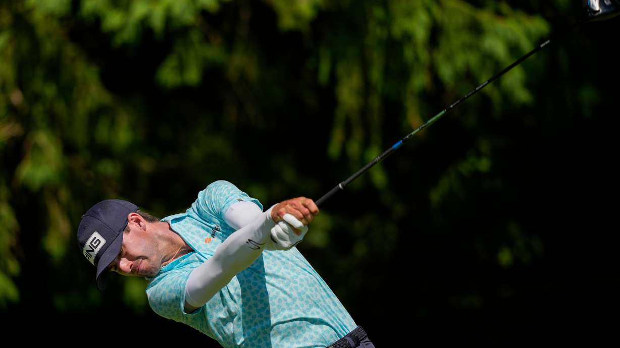 Alex Smalley hits from the fourth tee during the third round of the PGA Championship golf tournament at Aronimink Golf Club, Saturday, May 16, 2026, in Newtown Square, PA.