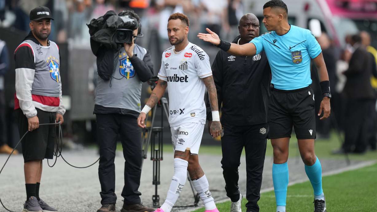 Santos' Neymar leaves the field after being substituted during a Brazilian Championship soccer match against Coritiba in Sao Paulo, Sunday, May 17, 2026.
