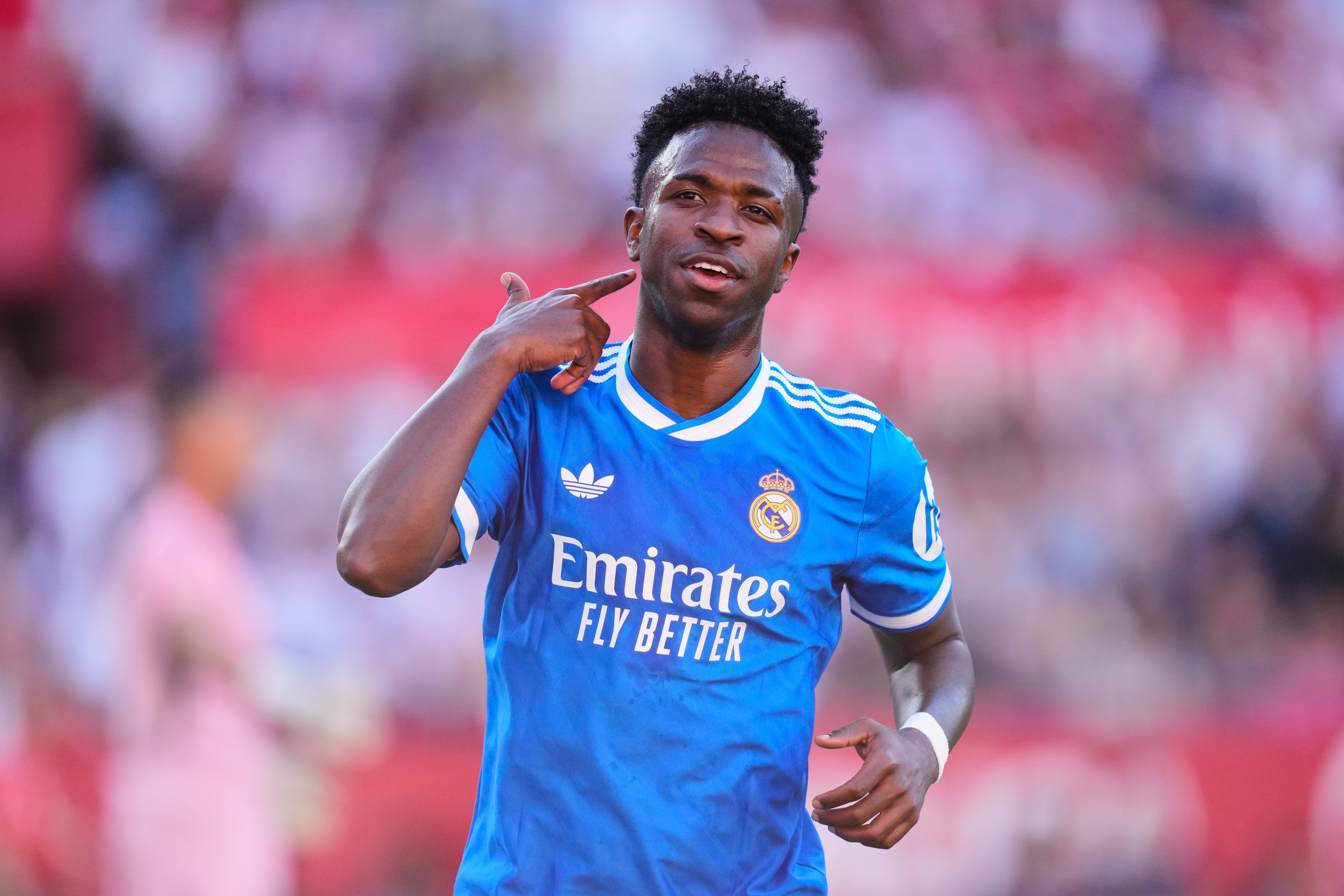 Real Madrid's Vinicius Junior celebrates after scoring the opening goal during the Spanish La Liga soccer match between Real Madrid and Sevilla in Seville, Spain, Sunday, May 17, 2026. 
