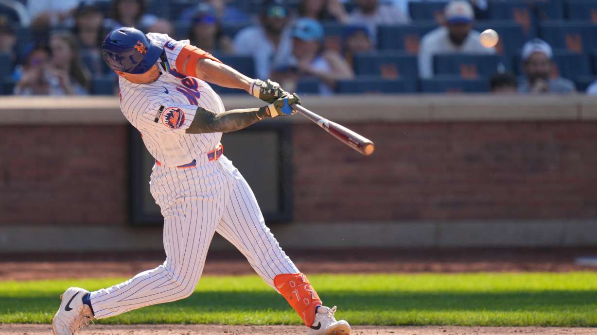 New York Mets' Tyrone Taylor hits a three-run home run during the ninth inning of a baseball game against the New York Yankees, Sunday, May 17, 2026, in New York.
