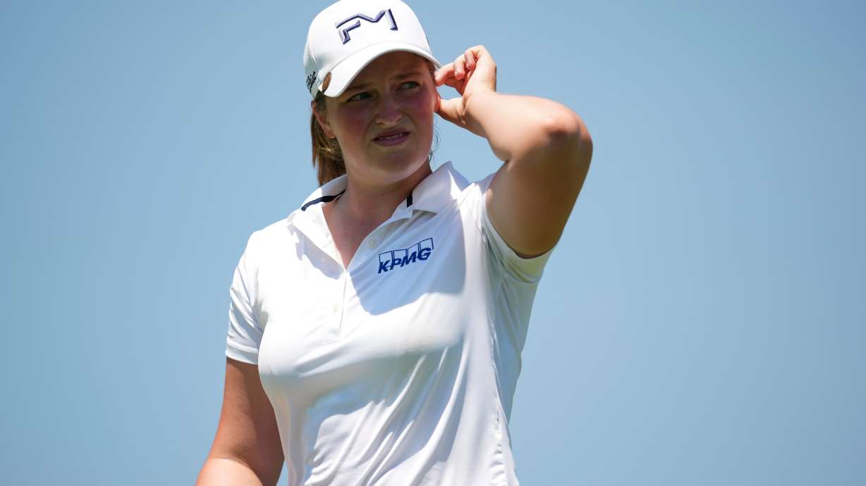 Lottie Woad looks on from the first hole during the final round of the Queen City Championship LPGA golf tournament at Maketewah Country Club, Sunday, May 17, 2026, in Cincinnati.