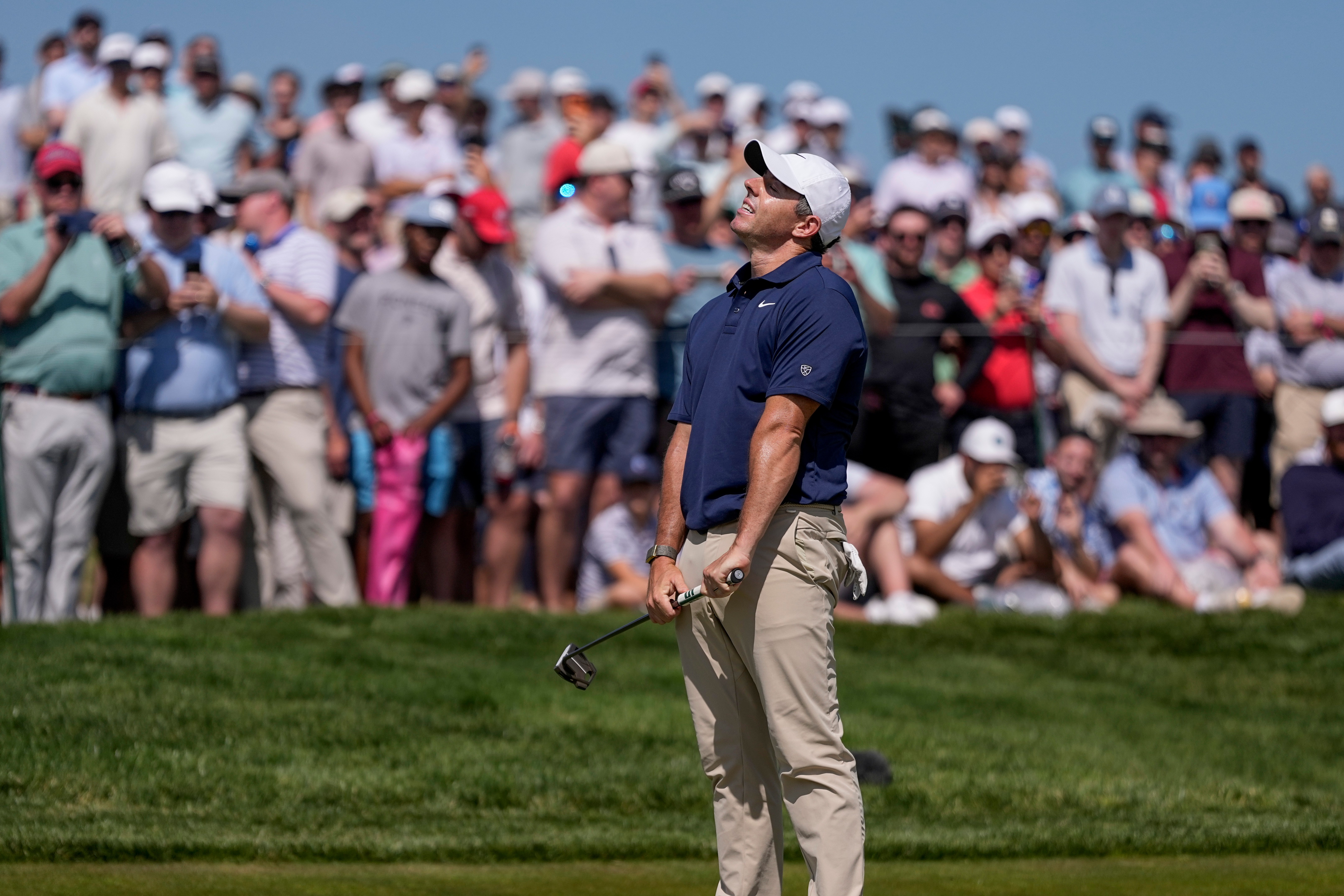 Rory McIlroy, of Northern Ireland, reacts to a missed putt on the seventh green during the final round of the PGA Championship golf tournament at Aronimink Golf Club, Sunday, May 17, 2026, in Newtown Square, PA. 