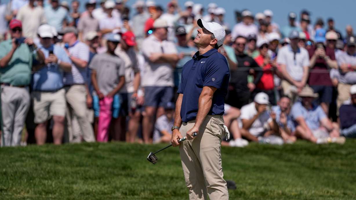 Rory McIlroy, of Northern Ireland, reacts to a missed putt on the seventh green during the final round of the PGA Championship golf tournament at Aronimink Golf Club, Sunday, May 17, 2026, in Newtown Square, PA.