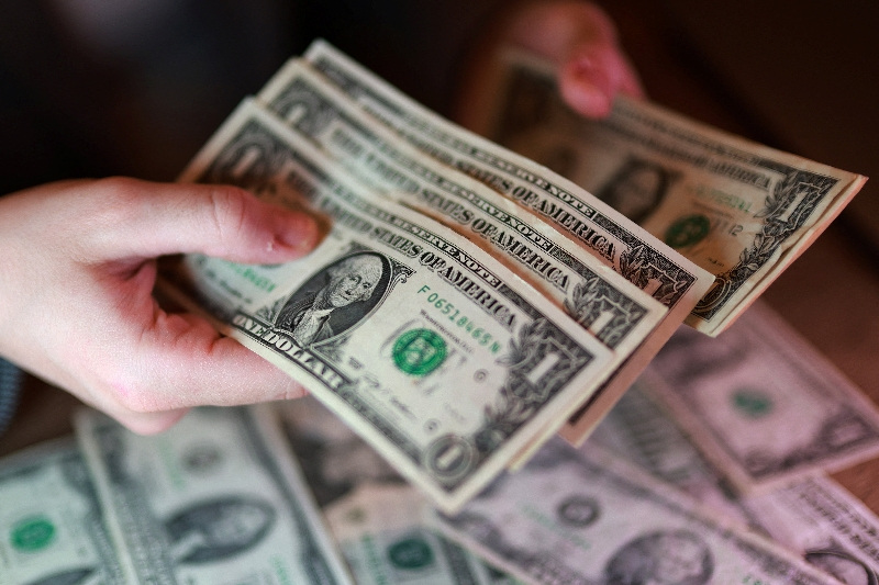 Dollar retreats on report of US-Iran sanctions deal