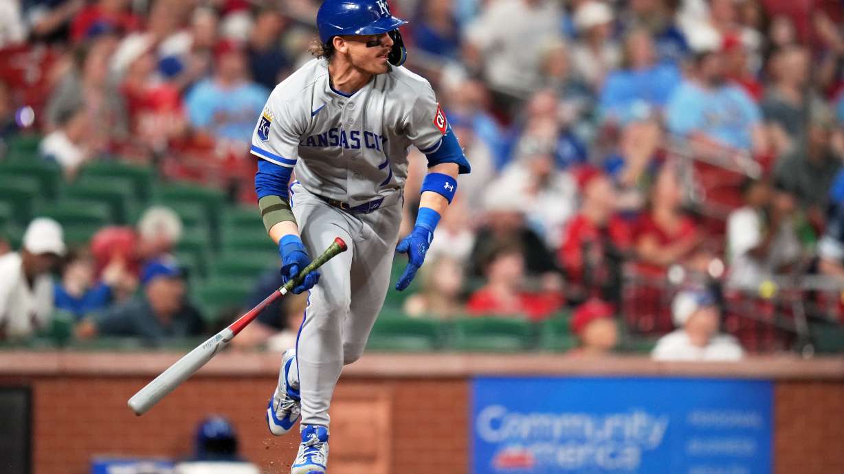 Kansas City Royals' Bobby Witt Jr. follows through on and RBI double during the 10th inning of a baseball game against the St. Louis Cardinals Friday, May 15, 2026, in St. Louis.