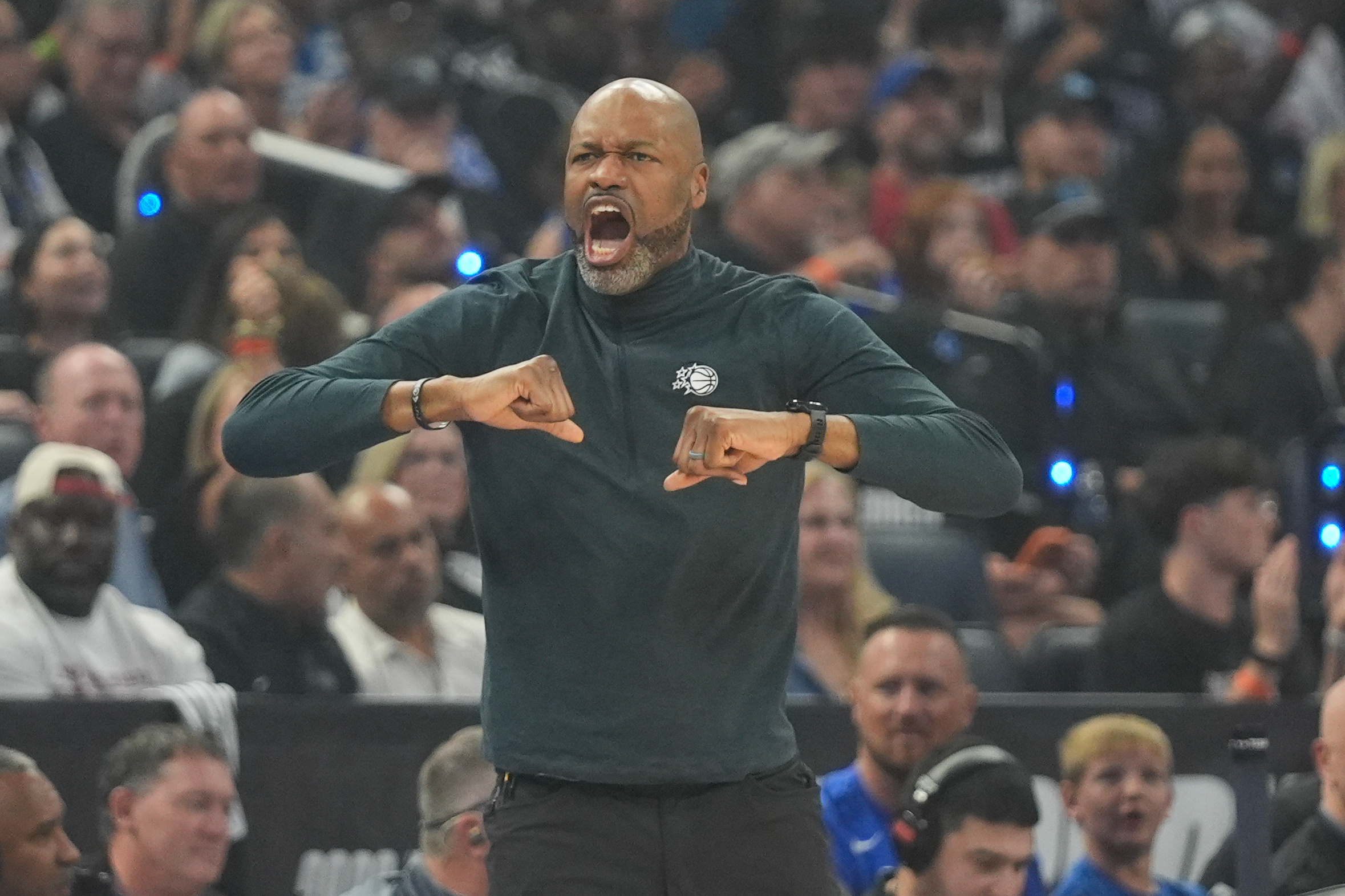 Orlando Magic head coach Jamahl Mosley directs his team against the Detroit Pistons during the first half in Game 6 of a first-round NBA basketball playoffs series, Friday, May 1, 2026, in Orlando, Fla. 