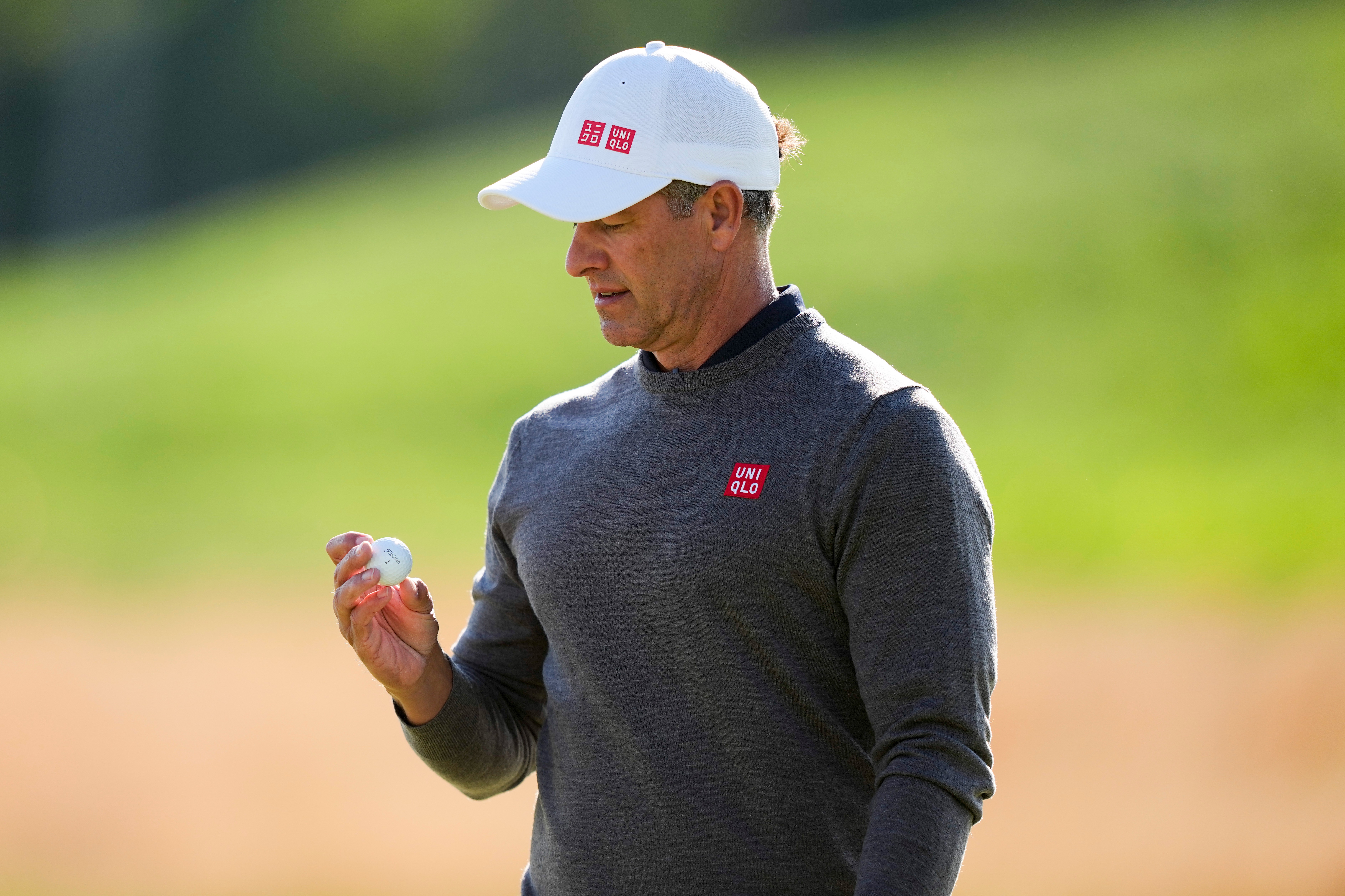 Adam Scott, of Australia, looks at his ball on the 10th green during the second round of the PGA Championship golf tournament at Aronimink Golf Club, Friday, May 15, 2026, in Newtown Square, PA. 