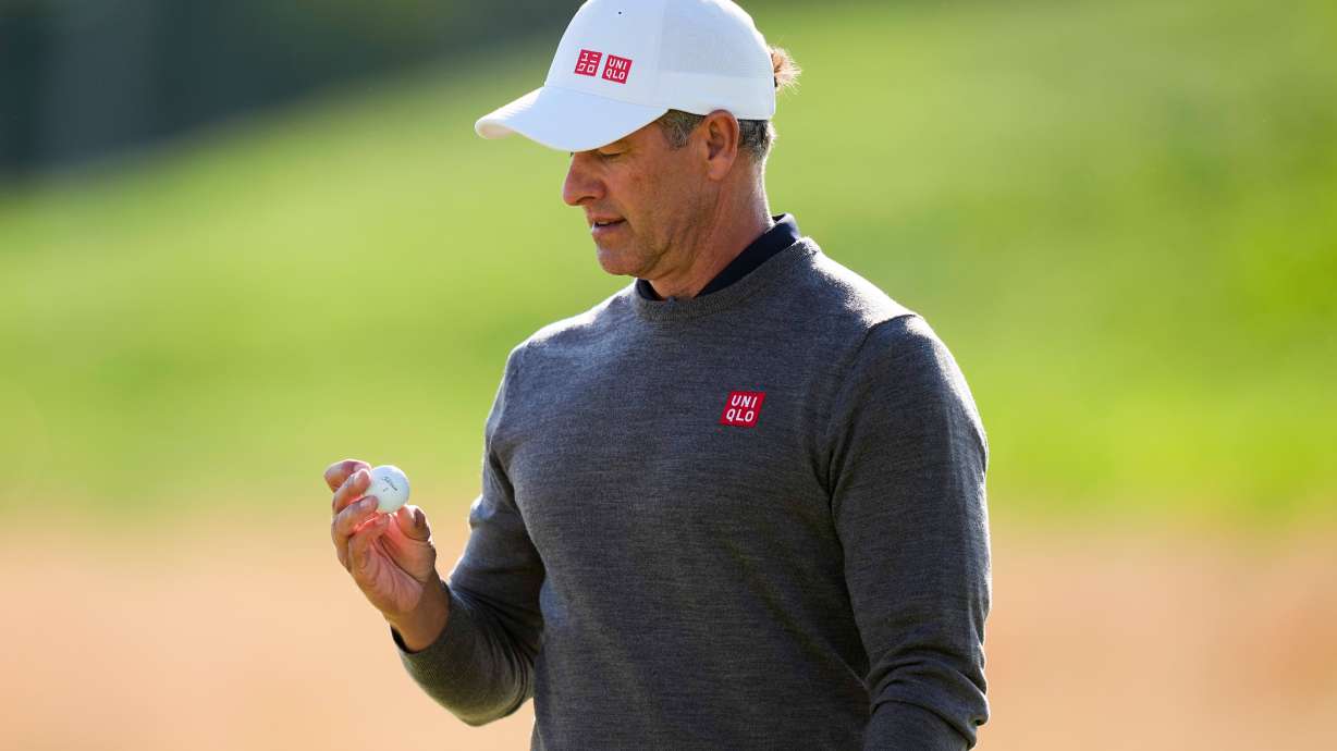 Adam Scott, of Australia, looks at his ball on the 10th green during the second round of the PGA Championship golf tournament at Aronimink Golf Club, Friday, May 15, 2026, in Newtown Square, PA.