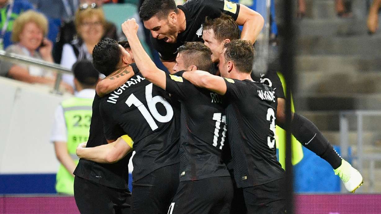 FILE - New Zealand's players celebrate after Chris Wood scored during their Confederations Cup Group A soccer match against Mexico in Sochi, Russia, June 21, 2017.