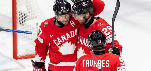 Canada beats Denmark and Crosby tallies 4 assists in third-period surge at hockey worlds