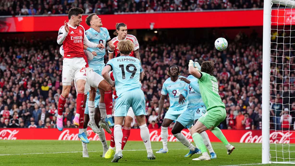 Arsenal's Kai Havertz, left, scores their side's first goal during the English Premier League soccer match between Arsenal and Burnley in London, Monday May 18, 2026.