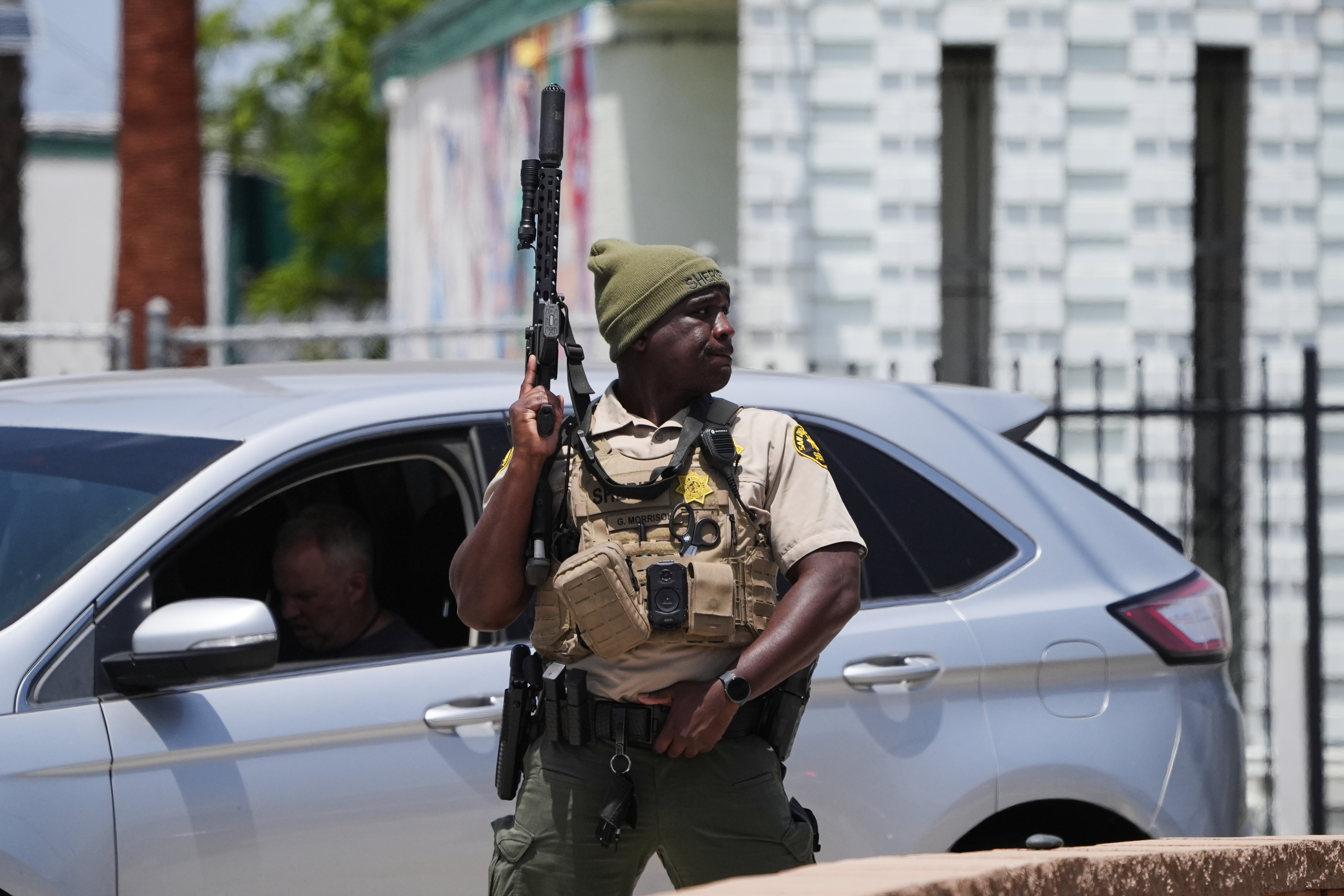 A sheriff's deputy stages at the scene of a shooting outside the Islamic Center of San Diego on Monday in San Diego.