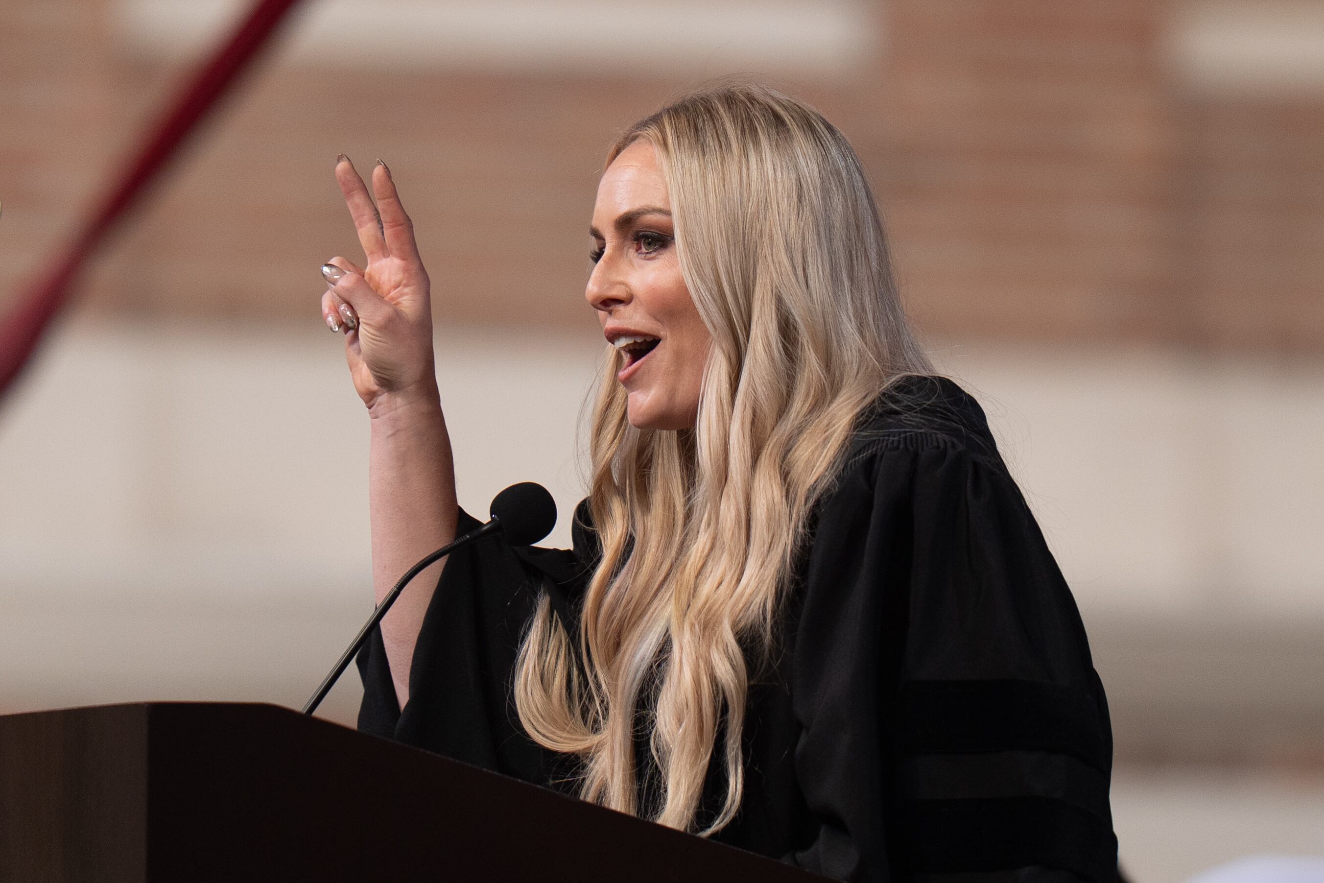 Alpine ski racer Lindsey Vonn gestures while delivering a commencement address for the University of Southern California's Annenberg School for Communication and Journalism in Los Angeles, Friday.