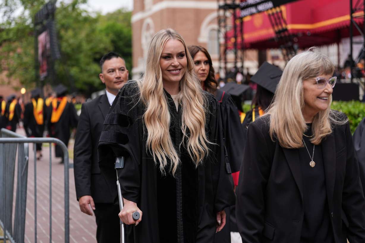 Alpine ski racer Lindsey Vonn leaves walks away on crutches after her commencement address for the University of Southern California's Annenberg School for Communication and Journalism in Los Angeles, Friday.