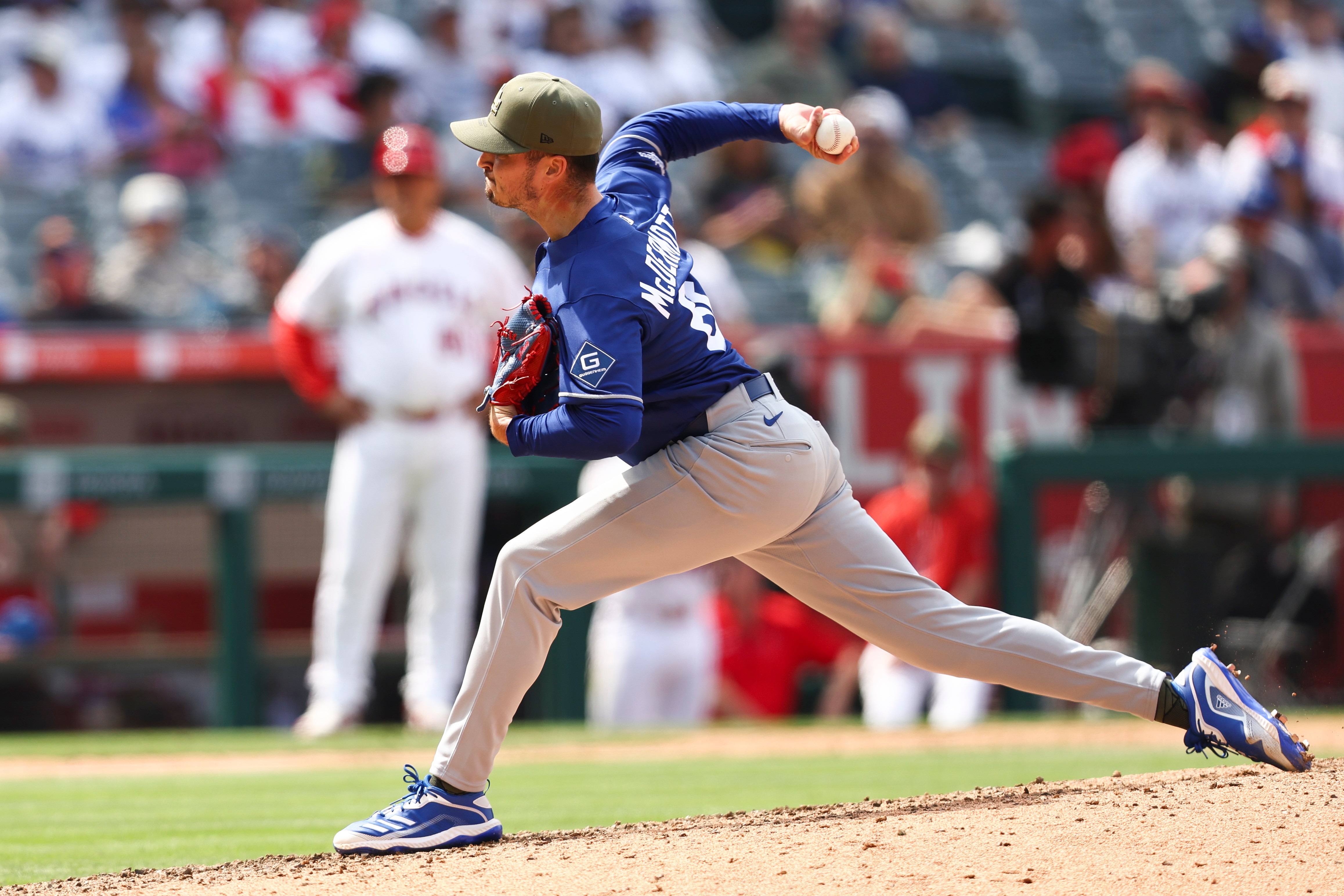 Los Angeles Dodgers pitcher Chayce McDermott throws to a Los Angeles Angels batter during the ninth inning of a baseball game, Sunday, May 17, 2026, in Anaheim, Calif. 