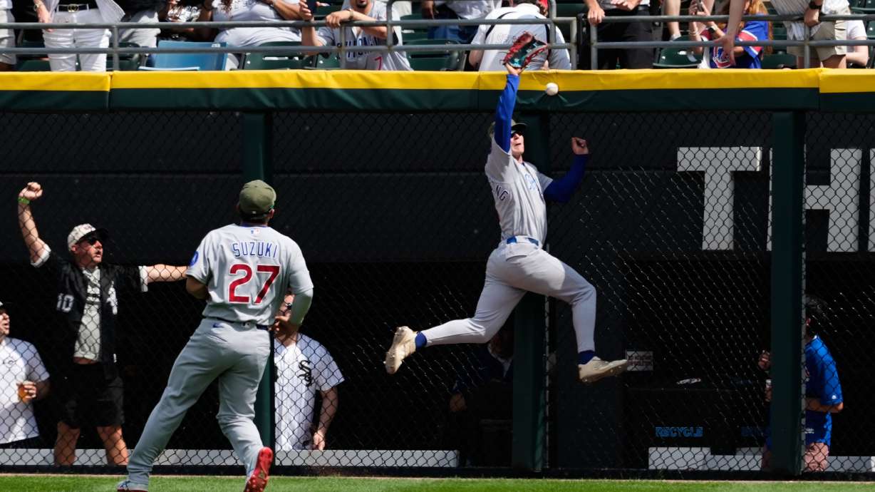 Chicago Cubs center fielder Pete Crow-Armstrong, right, cannot catch a two-run double hit by Chicago White Sox's Miguel Vargas during the fifth inning of a baseball game in Chicago, Sunday, May 17, 2026.