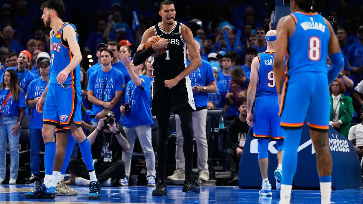 San Antonio Spurs forward Victor Wembanyama (1) celebrates after a dunk during the second overtime of Game 1 in a third-round NBA basketball playoffs series against the Oklahoma City Thunder Monday, May 18, 2026, in Oklahoma City.