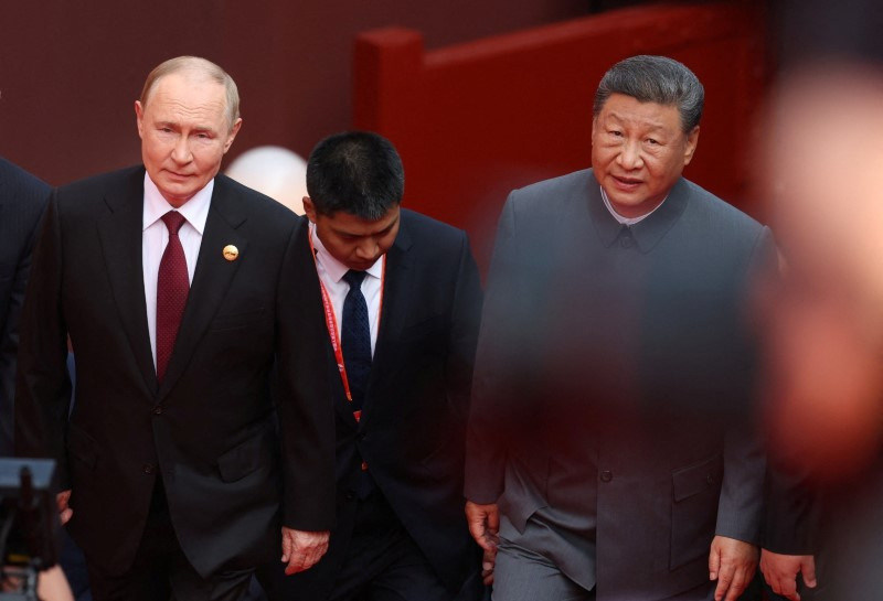 Xi to host 'old friend' Putin as China projects stable global role after Trump visit
