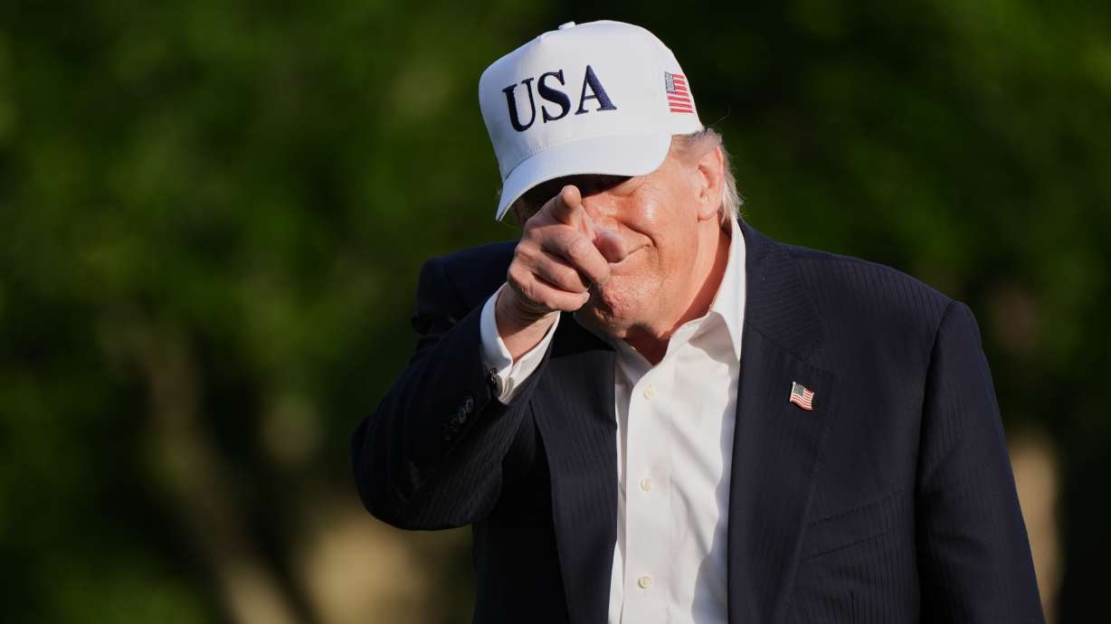 President Donald Trump gestures to reporters as he walks across the South Lawn of the White House, Friday, in Washington, on return from Beijing where he met with China's President Xi Jinping. Three one-time Trump antagonists go before voters Tuesday.