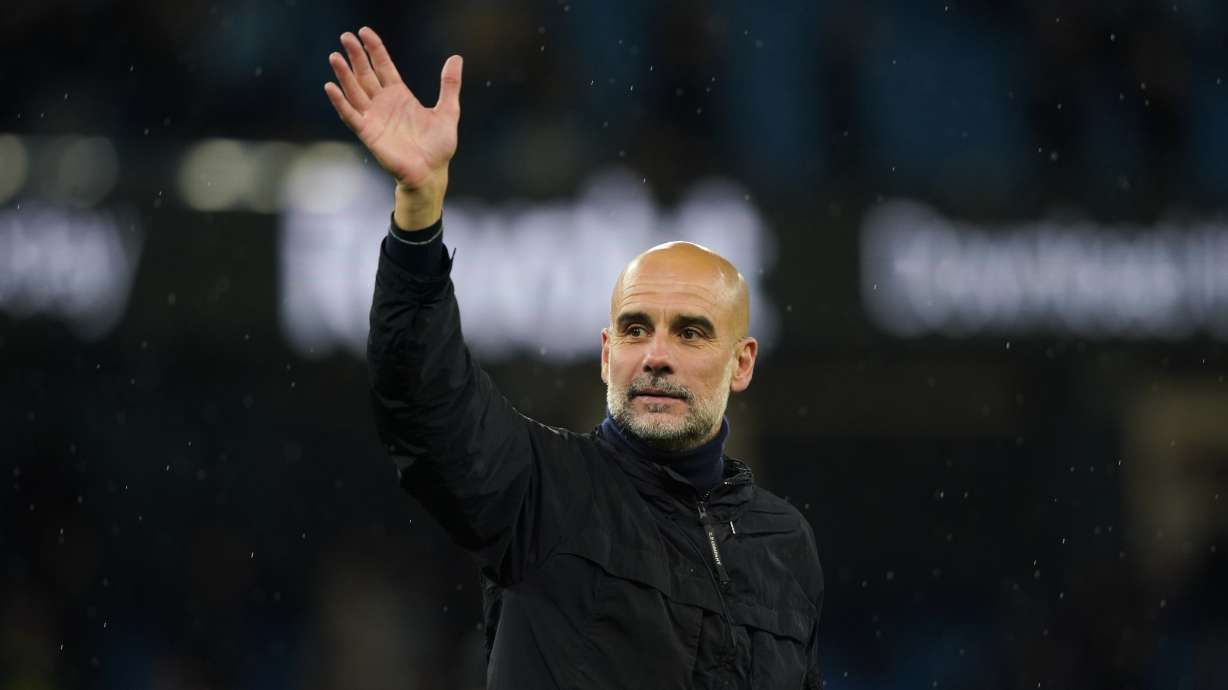 Manchester City's head coach Pep Guardiola greets fans at the end of the English Premier League soccer match between Manchester City and Crystal Palace in Manchester, England, Wednesday, May 13, 2026.
