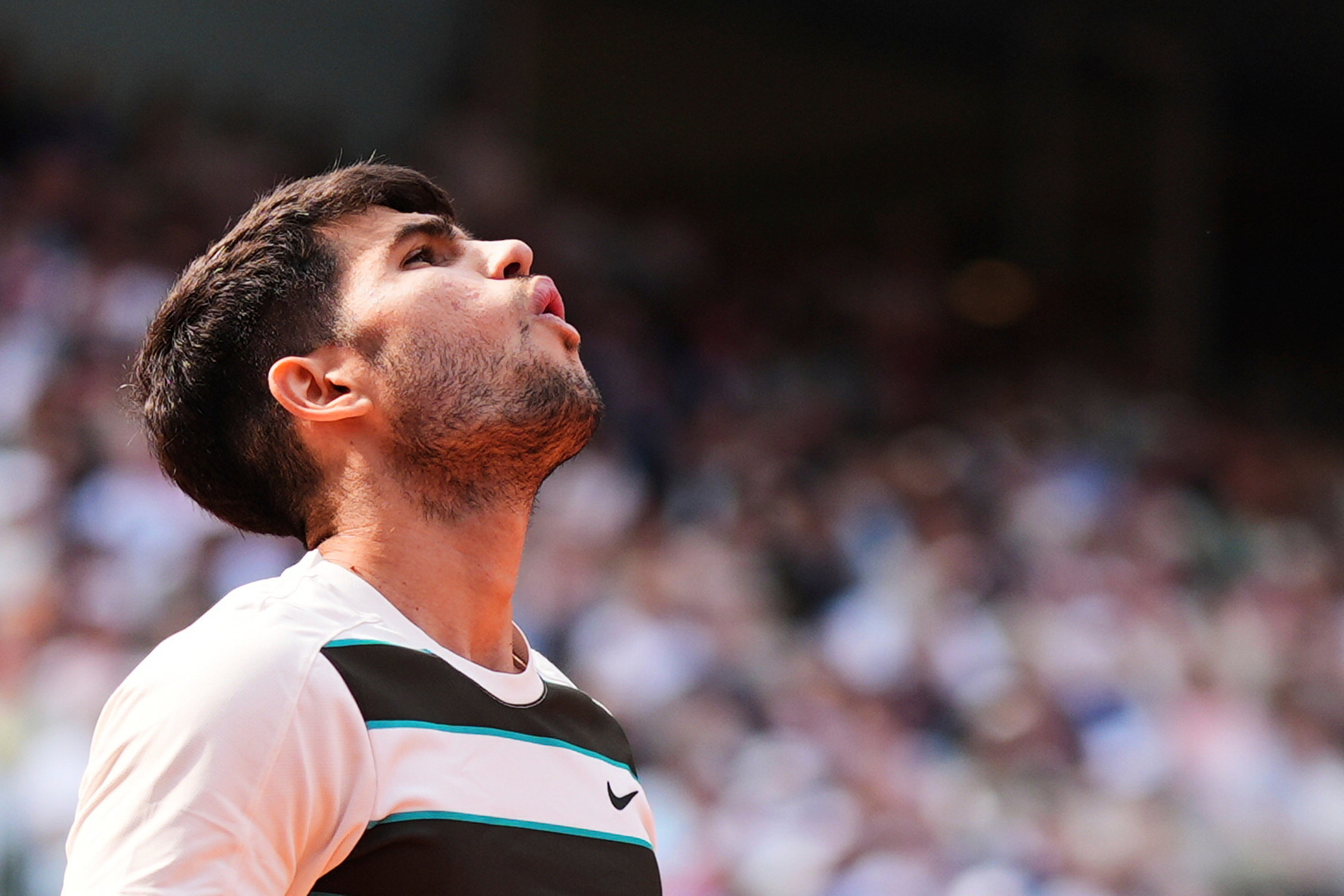 FILE - Spain's Carlos Alcaraz reacts during the final of the French Open tennis tournament against Italy's Jannik Sinner, Sunday, June 8, 2025, in Paris. 