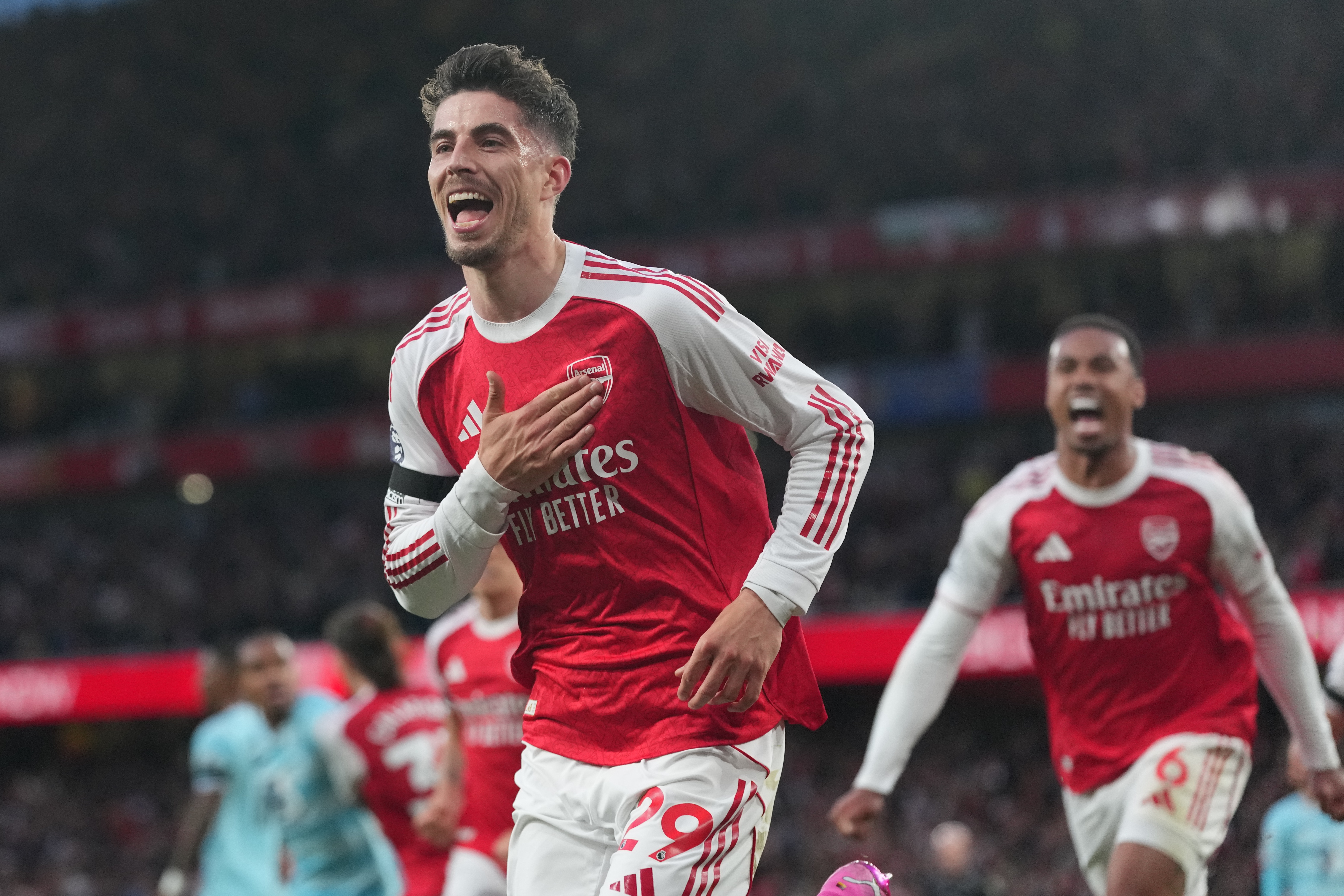 Arsenal wins its first Premier League title in 22 years after Man City draws with Bournemouth